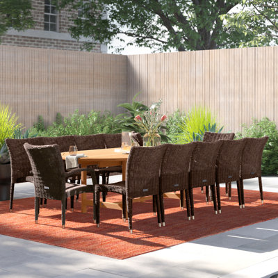 Anautica 12 - Person Teak Solid Wood Patio Dining Set Extendable Oval Table