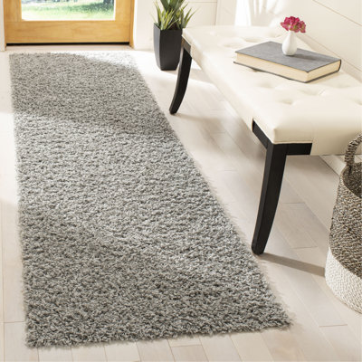 Ashleigh-Marie Solid Color Machine Woven Polypropylene Area Rug in Light Gray