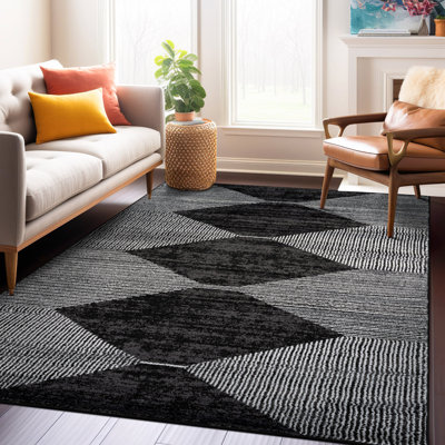 Tapis noir à rayures géométriques ivoire