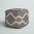 Guinda Upholstered Pouf