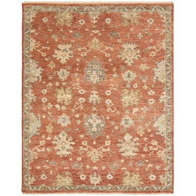 Kiernen Wool Flroal Area Rug in Rust