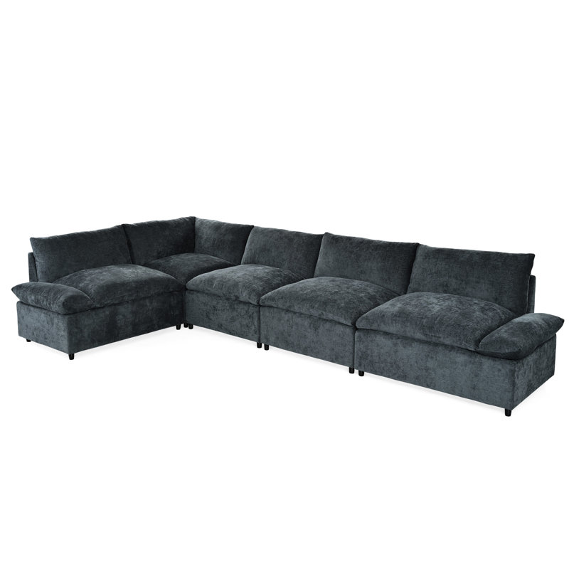 Canapé modulaire gris foncé avec revêtement et compartiments de rangement dissimulés