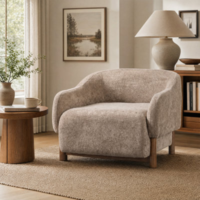 Fauteuil d'appoint Bronte en chenille de style moderne du milieu du siècle, avec accoudoirs encastrés, dossier fixe et pieds en bois d'hévéa et de noyer.
