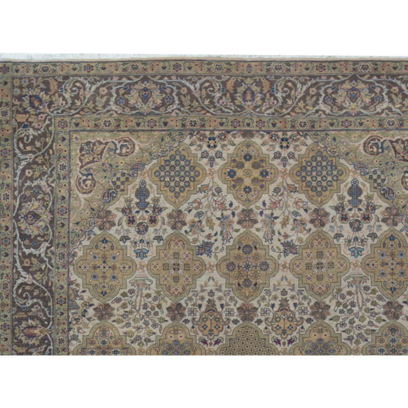 Lamani Wool Oriental Area Rug in Ivory/Blue/Green