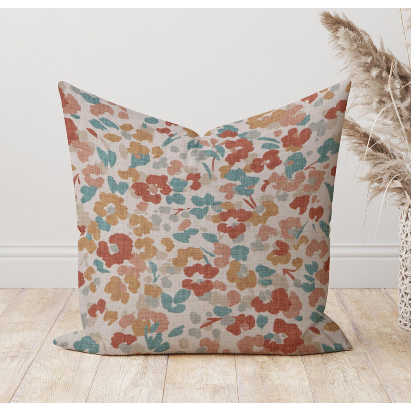 Housse de coussin orange et sarcelle à motif floral abstrait, H 12 po x l 19 po