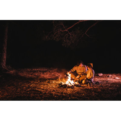 Young Father And Son Roasting Marshmallows by Wundervisuals - No Frame Art Prints on Canvas