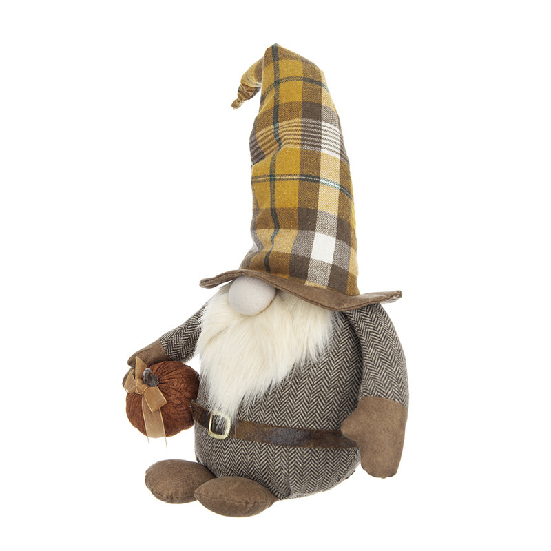 Gnome tenant une citrouille