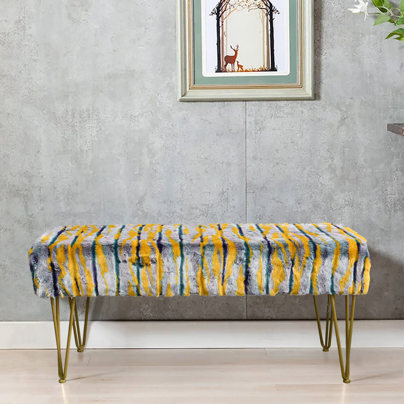 Mapoles Upholstered Ottoman, Teal Faux Fur