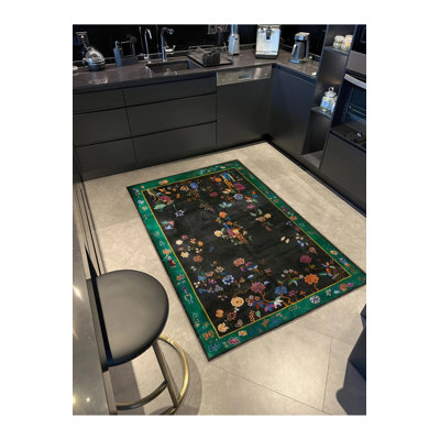 Tapis intérieur / extérieur floral noir Ince