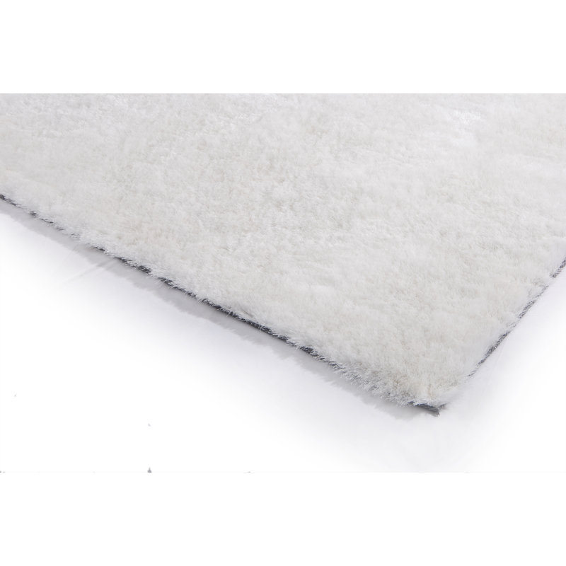Tapis gris touffeté à la main