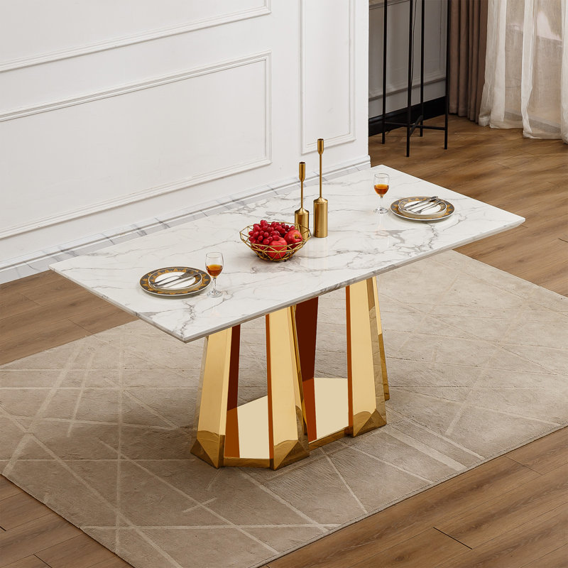 Table de salle à manger exquise en faux marbre, base moderne en acier inoxydable, idéale pour la cuisine