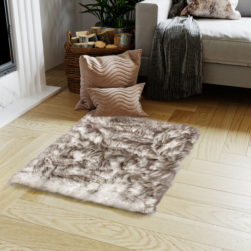 Carignano Handmade Shag Ivory / Black Tips Faux Fur Area Rug, Rectangle 5' x 7'