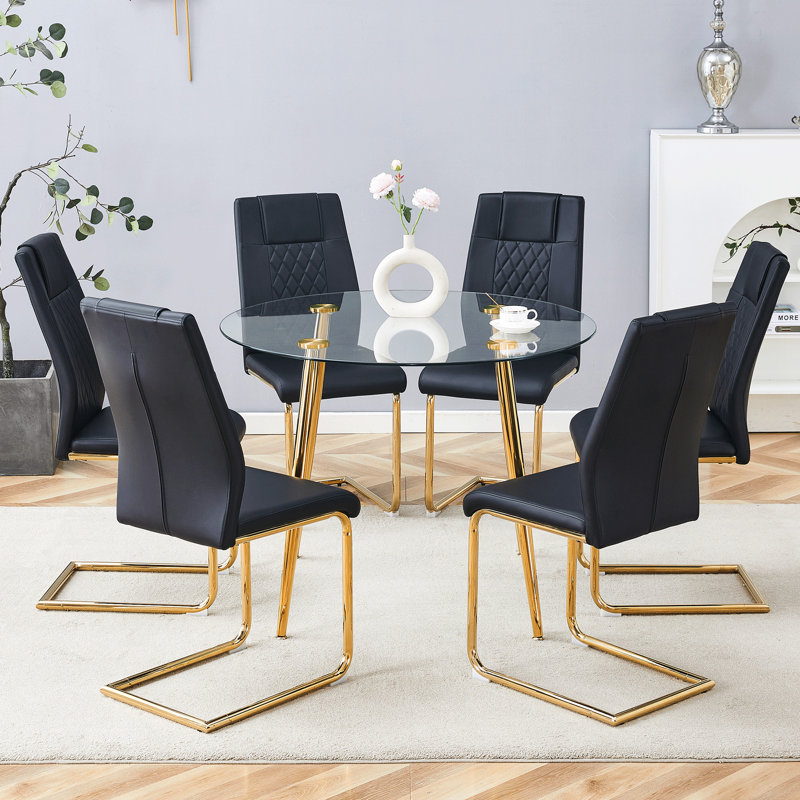 Table de salle à manger ronde en verre trempé avec pieds dorés et 6 chaises en cuir PU haut de gamme modernes pour la décoration