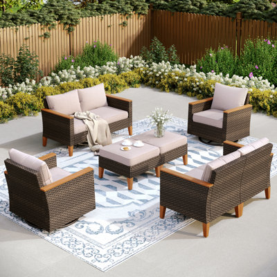 Ensemble de conversation d'extérieur en osier avec chaises pivotantes Argyri