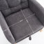 Chaise berçante avec repose-pieds à haut dossier-549167387