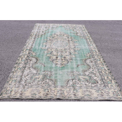 Tapis turc rétro avec motif floral vert et motif de médaillon élégant pour la décoration intérieure
