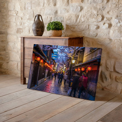 Canvas A Vibrant Tokyo Street Scene During Cherry Blossom Season Illuminated Wall Art By Glowing Red Lanterns And Neon Signs Canvas Wall Art