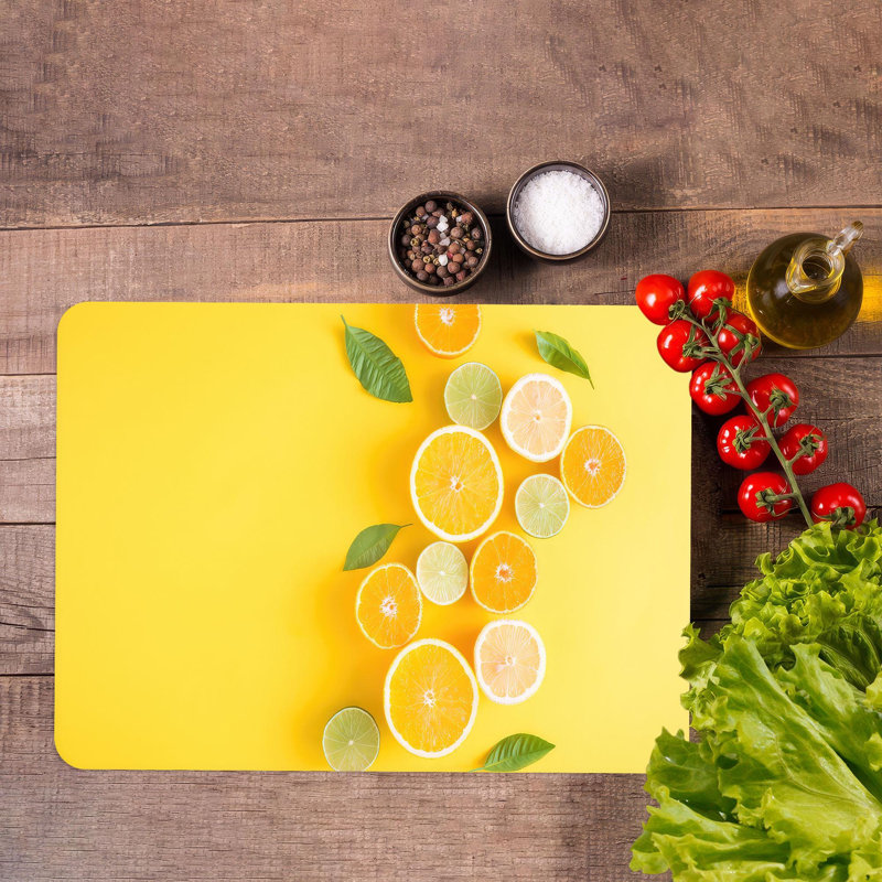 Planche de service rectangulaire jaune et orange éclatante avec un design moderne de citron fabriqué en verre durable, idéale pour la cuisine