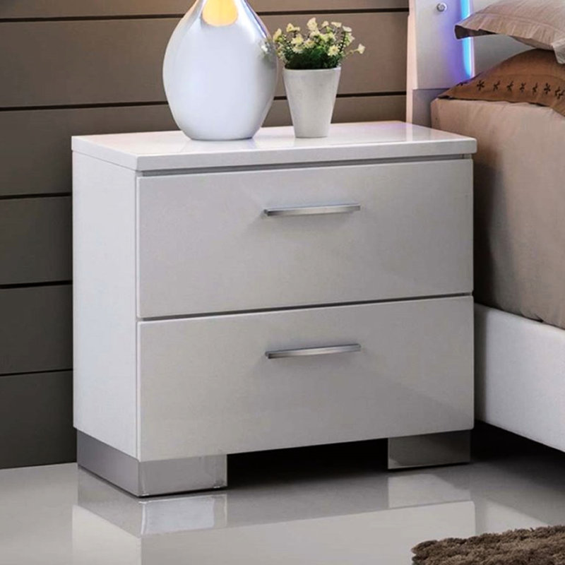 Table de chevet blanche à 2 tiroirs avec pieds pour une chambre à coucher ultrabrillante