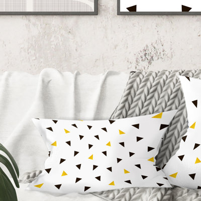 Coussin décoratif tendance imprimé noir et or à motif triangulaire Mid-Century