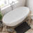 61" x 30" Solid Surface Stone Resin Oval-shaped Freestanding Soaking Bathtub with Overflow