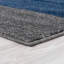 Tapis décoratif bleu fait à la main à motif géométrique-25803807