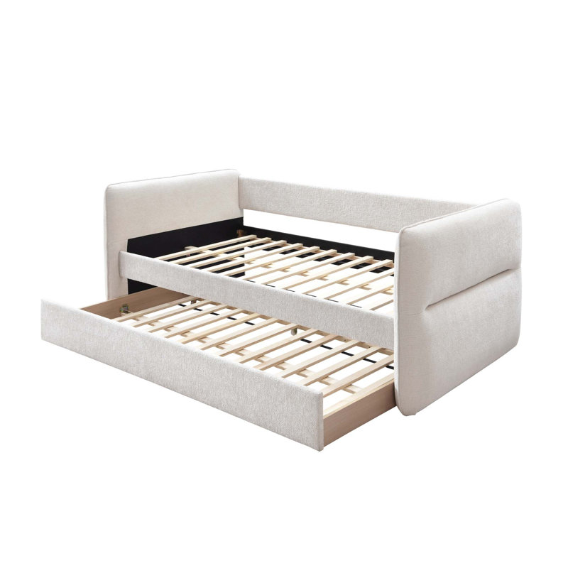 Modern Daybed with Pull-Out Trundle, Button Tufting, and Nailhead Trim for Versatile Bedroom or Living Room Use.