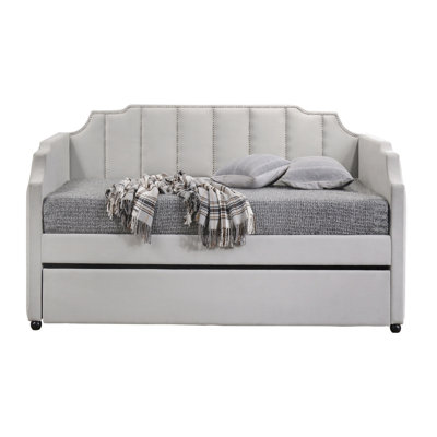Lit de jour simple en velours gris avec lit gigogne et garniture cloutée confortable