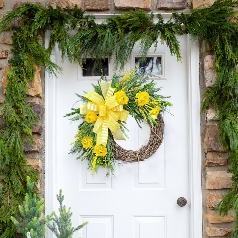Décoration de fête exquise avec couronne de fleurs artificielles