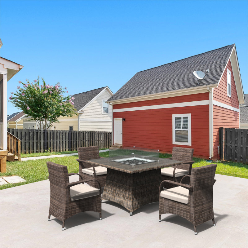 Amayiah 4 - Person Wicker Patio Dining Set with Square Table , Cushions Included