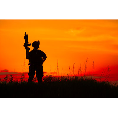 Military Soldier At Sunset by KaninRoman - Wrapped Canvas Print