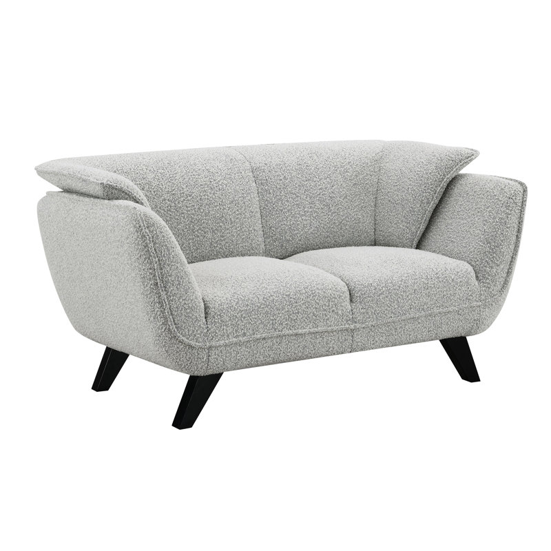 Causeuse Nayeli Boucle: une solution confortable et durable pour vous détendre et recevoir avec un confort optimal.