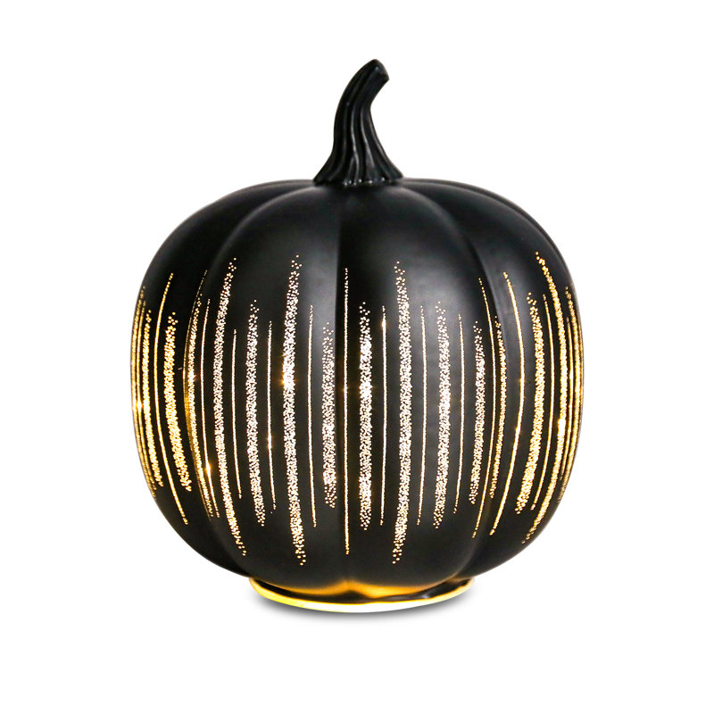 Ornement en forme de citrouille d'Halloween en verre noir avec rayures dorées brillantes et lumières DEL intégrées pour Spooky - décor chic