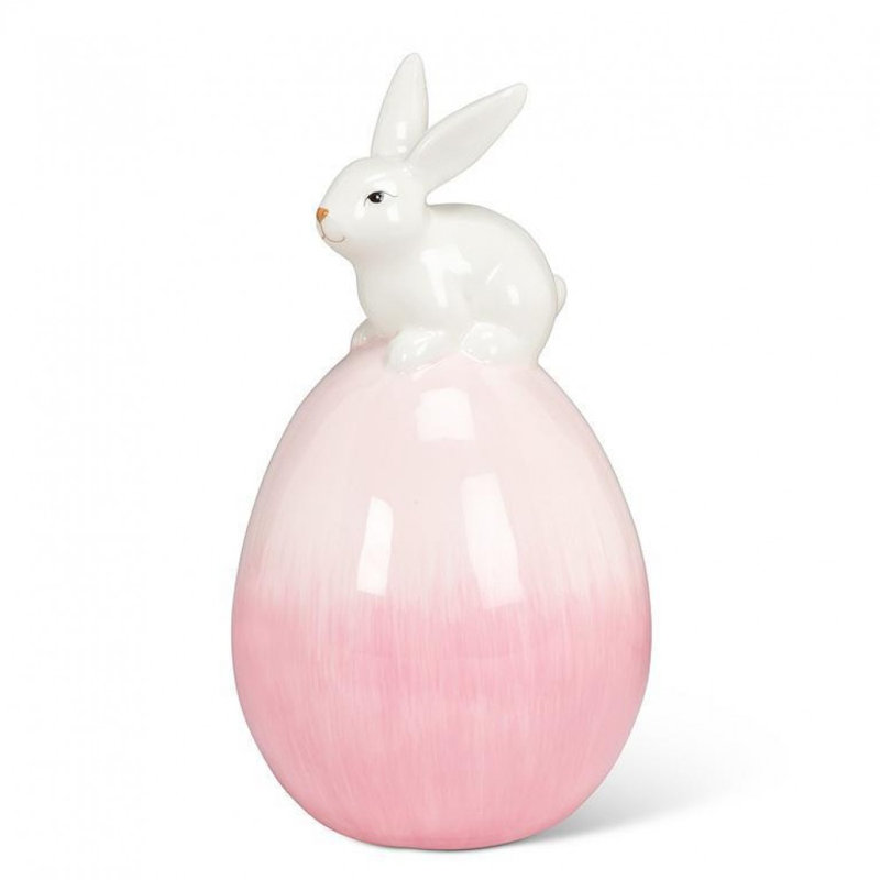 Figurine lapin en équilibre sur un œuf