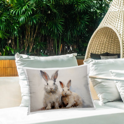 Coussin d'extérieur imprimé Fluffy Spring Bunnies par Arlington Prints