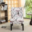 Fauteuil en tissu imprimé avec motif floral mauve - Espace de vie moderne, assise confortable et sans accoudoirs