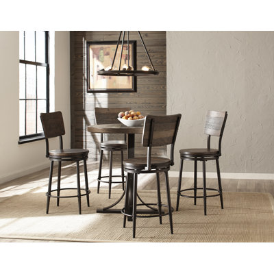 Huley 4 - Person Pedestal Dining Set