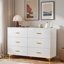 Commode moderne avec 6 tiroirs, poignées dorées et pieds triangulaires dorés