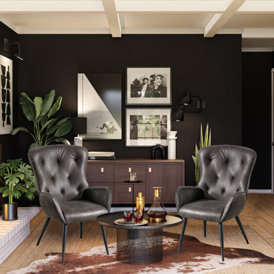 Fauteuil à oreilles rembourré en cuir Mahendra