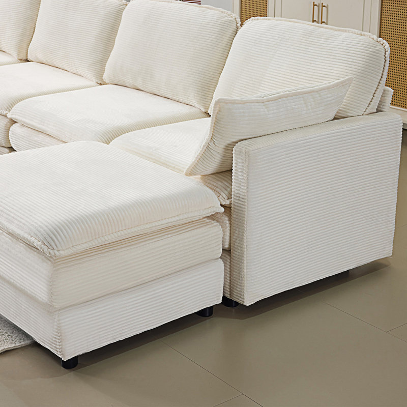 Canapé modulaire 4 places avec 2 repose-pieds et 2 coussins décoratifs
