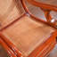 Chaise berçante en rotin naturel