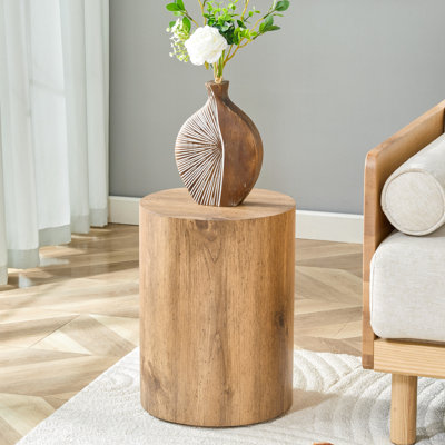 Table basse cylindrique simple en grain de bois, mobilier de salon en panneau de fibres à densité moyenne. Convient aux salons de style industriel.
