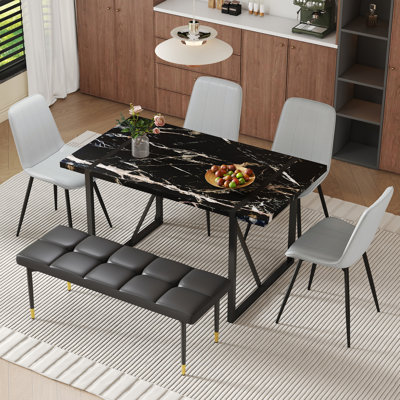 Ensemble de table de salle à manger moderne en marbre noir avec chaises et banc en cuir PU - Un luxe élégant pour les maisons contemporaines