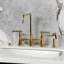 Kingston Brass Manhattan Two-Handle 4-Hole Deck Mount Bridge Kitchen Faucet With Brass Sprayer-103181162