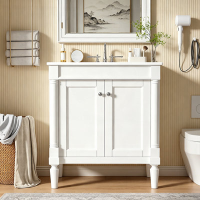 Meuble-lavabo luxueux de 30 pouces avec lavabo en céramique, portes à fermeture douce et pieds en bois massif pour un rangement élégant