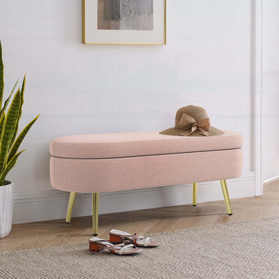 Banc de rangement repose-pieds ovale avec revêtement en flanelle et pieds en métal robustes, parfait pour les espaces de vie modernes et confortables
