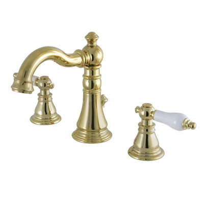 Robinet de salle de bain espacé à deux poignées à 3 poignées et fixation sur le comptoir avec bonde escamotable Kingston Brass
