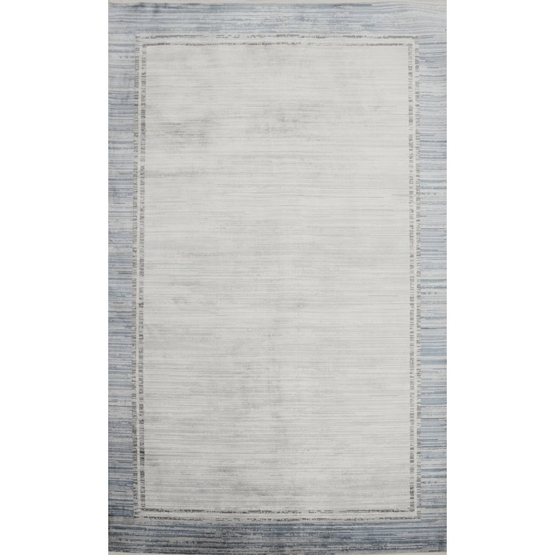 Tapis ombragé intemporel 5 x 8 avec bords encadrés bleus raffinés
