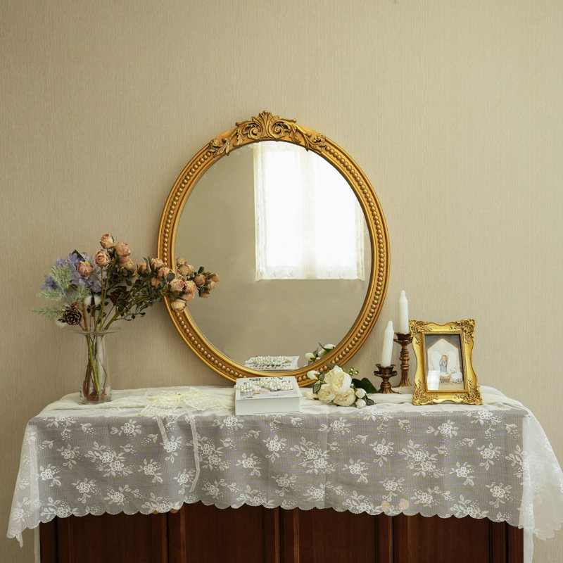 Élégant miroir décoratif ovale mural avec bordure dorée complexe
