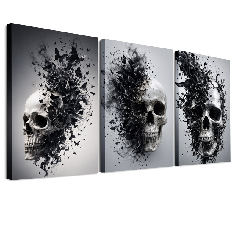 Ensemble de 3 toiles murales monochromes représentant un crâne humain se dissolvant dans le décor d'Halloween